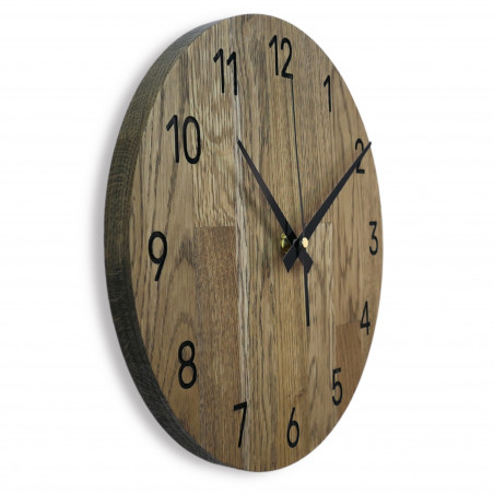 Wooden wall clock made of oak wood Wooden wall clock made of oak wood