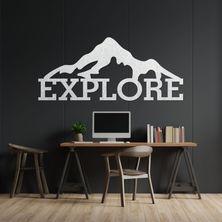 Carved wood image of a mountain - EXPLORE