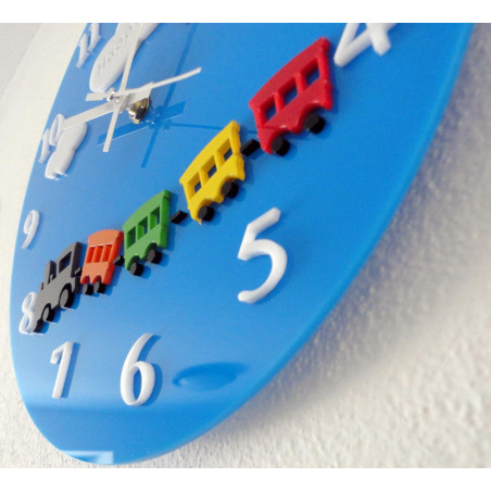 Wall clock in blue with a simple design Wall clock in blue with a simple design