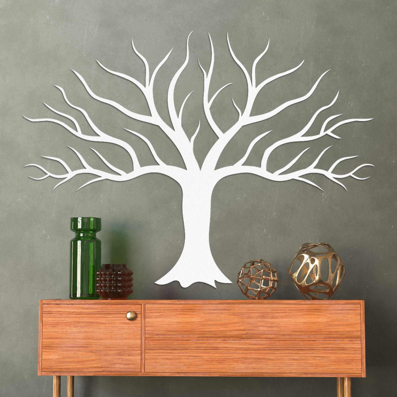 large white painting on the wall with tree branches