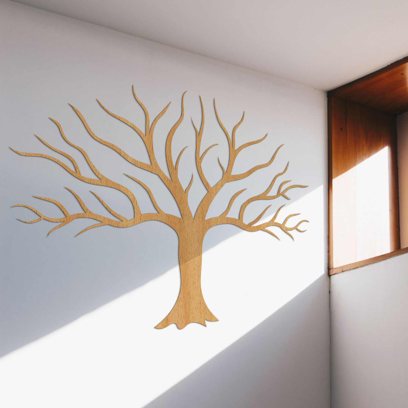 Wooden picture on the wall with tree branches