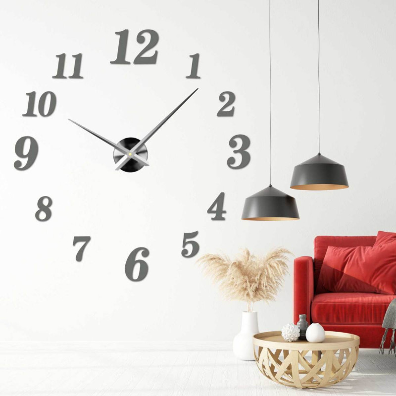 Detail of the dial of a plexiglass adhesive clock with black hands