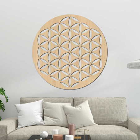 Harmonious symbol Flower of Life precisely carved into a wooden circle Harmonious symbol Flower of Life precisely carved into a wooden circle