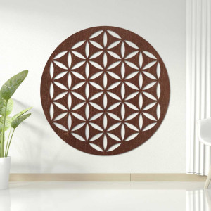 Wooden wall decoration with a geometric flower of life pattern displayed on a light wall.