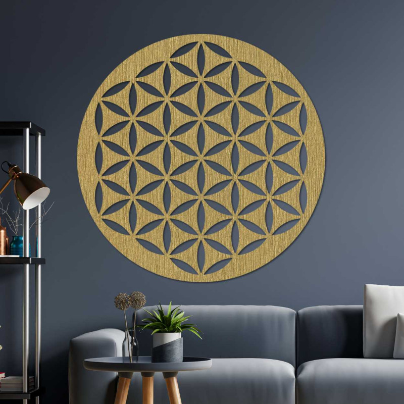 A detailed carved wooden circle with a sacred geometry motif in a modern interior.