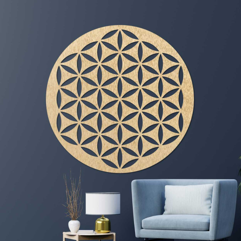 Decorative wooden picture in the shape of a circle with a repeating geometric pattern.