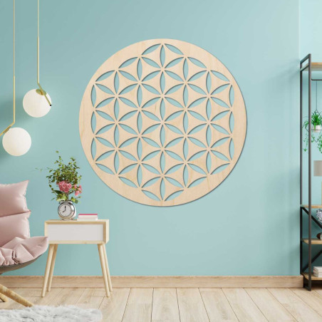 A wooden wall art piece with the spiritually attuned Flower of Life symbol.