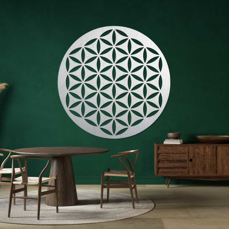 A geometric wooden painting hanging on the wall in a minimalist room.