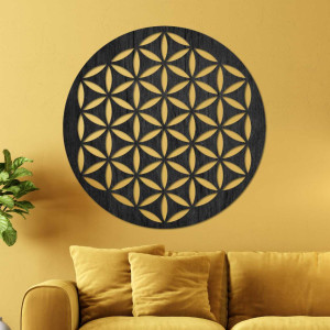 Wooden wall decoration with a geometric flower of life pattern displayed on a light wall. 2