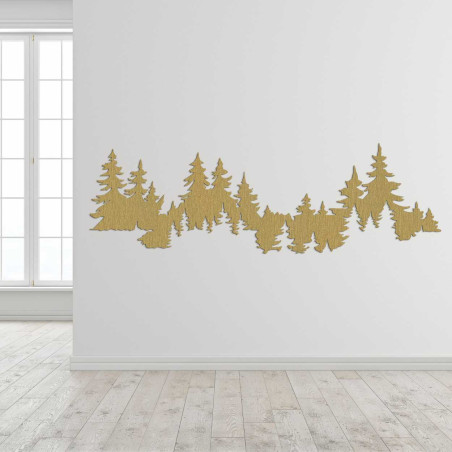 Wooden cutout of a coniferous forest used as wall art.
