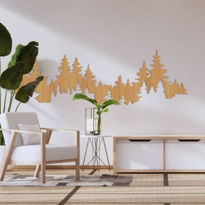 Wooden cutout of a coniferous forest used as wall art.
