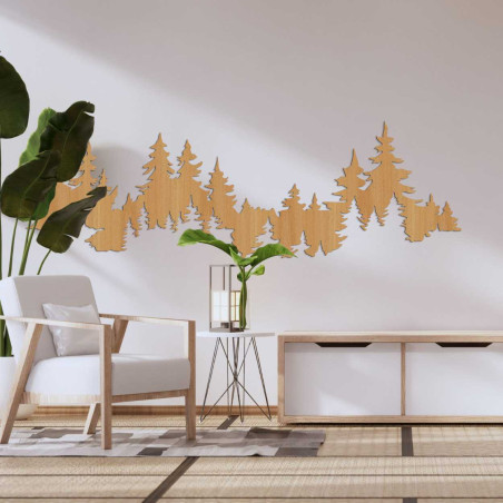 Wooden cutout of a coniferous forest used as wall art.