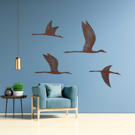 Wooden motif of four birds flying to the right