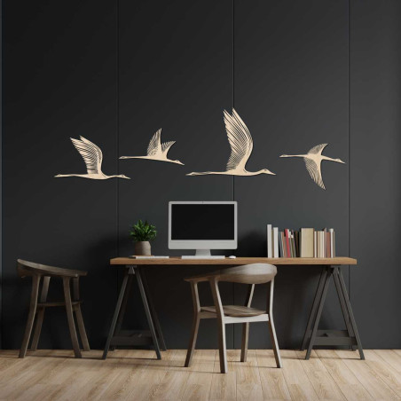 Decorative composition of flying birds with delicate carved details