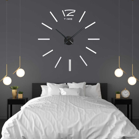 Designer clock with an imaginative layout and modern hour markings. Designer clock with an imaginative layout and modern hour markings.