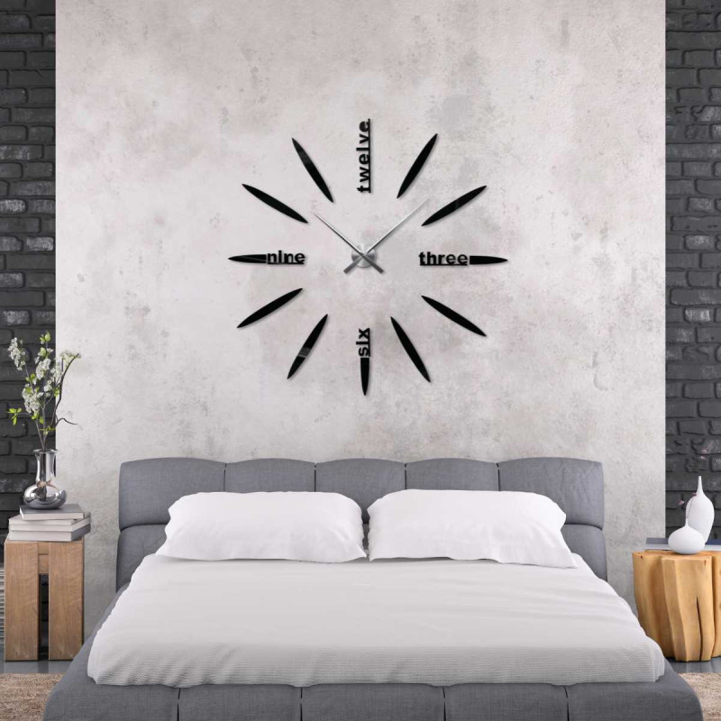 Stylish 3D clock with twelve, three, six and nine in place of traditional numbers.