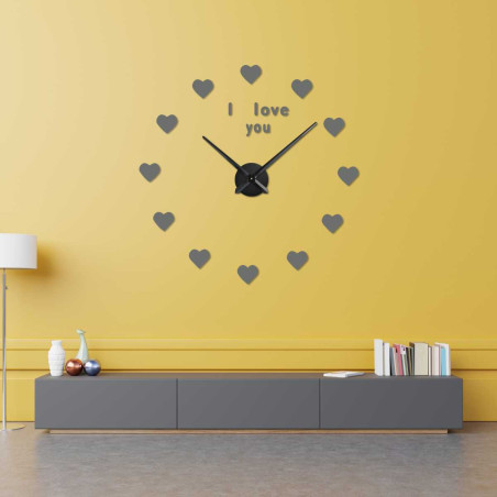 Wall clock with a heart design and the inscription "I love you" as the central element of the dial.