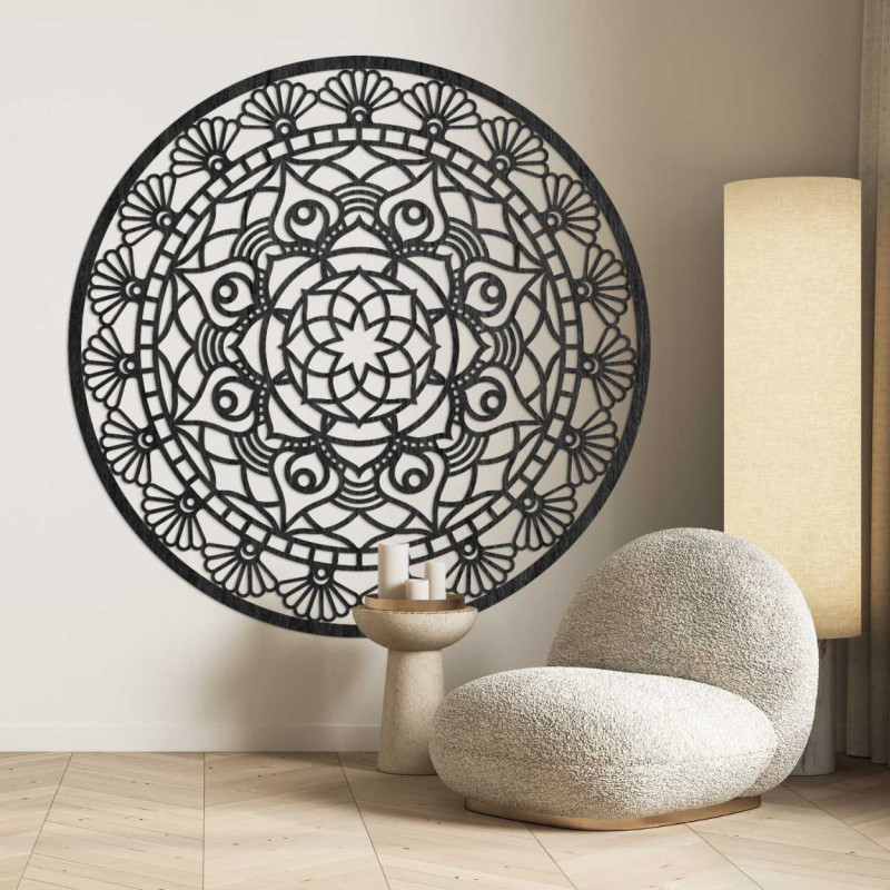 Wall decoration with detailed cutouts that create a delicate and airy ornament.