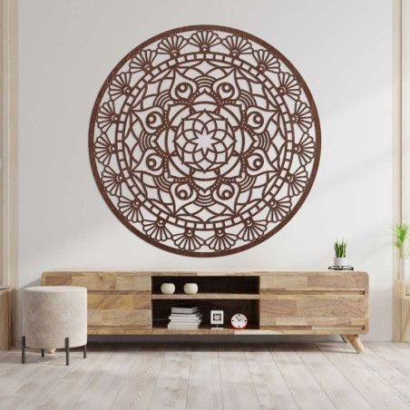 A decoration in the shape of a circle with a complex, regularly repeating ornamental pattern.