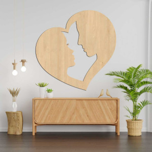 Decoration depicting the silhouette of a man and a woman in profile enclosed in one heart. 2