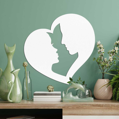 A heart-shaped decoration in which the contours of two faces are connected.