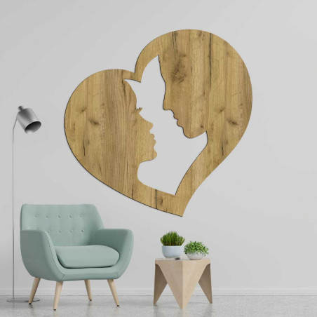 An elegant decoration depicting the moment of closeness of two faces in one heart.