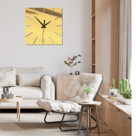 Black wall clock without numbers with a modern design