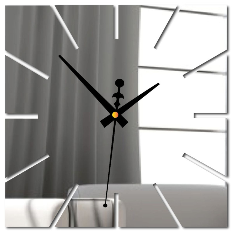 Modern wall clock made of plexiglass with white hands and a black background