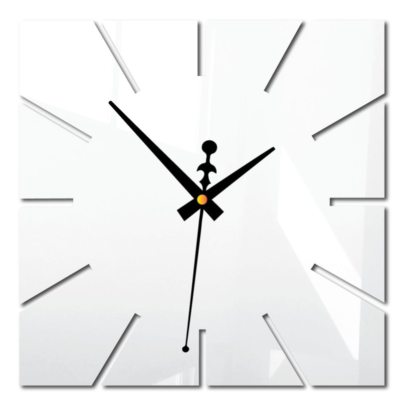 A clock with a geometric layout and distinctive hands
