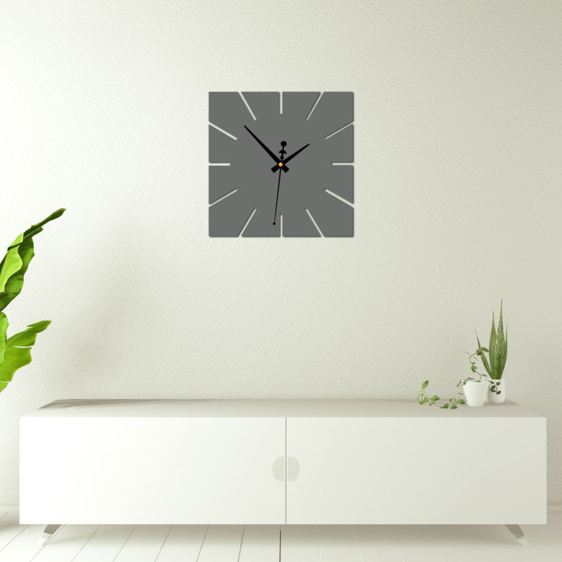 A clock with a strong contrast between the background and the hands