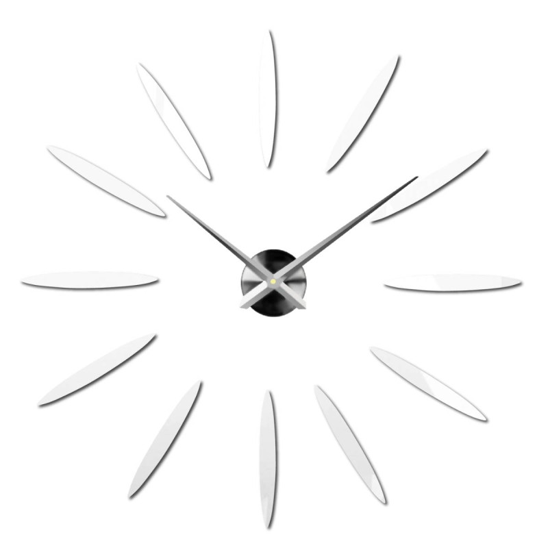 A creatively placed clock that creates a sunbeam effect using gold elements.