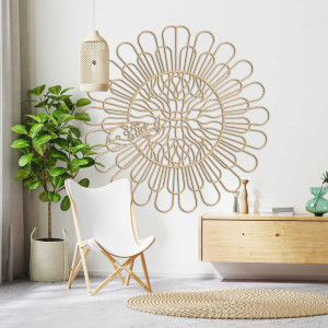 Modern wall decoration with delicate curves and a central abstract design.