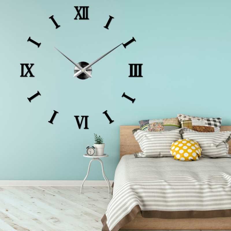 A minimalist black clock that will add depth and style to your wall thanks to its 3D design.