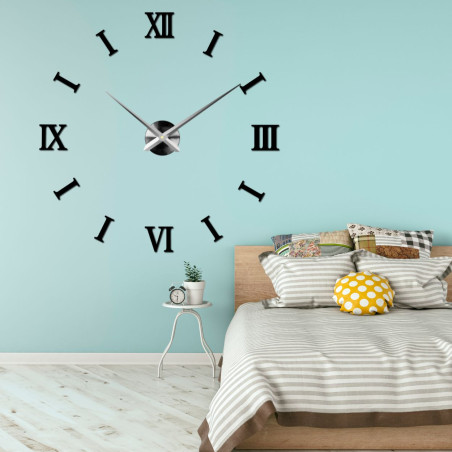 A minimalist black clock that will add depth and style to your wall thanks to its 3D design.