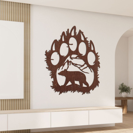 Brown Artistic wood carving depicting a symbolic bear footprint with a wildlife scene inside. Brown Artistic wood carving depicting a symbolic bear footprint with a wildlife scene inside.