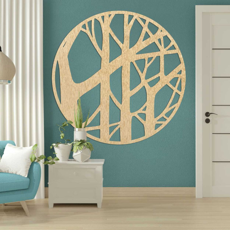 Circular wooden ornament hanging above a wooden chest of drawers
