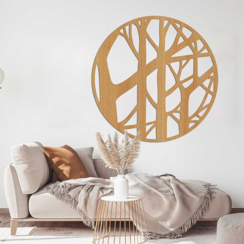 Round wooden decoration with carved tree branches