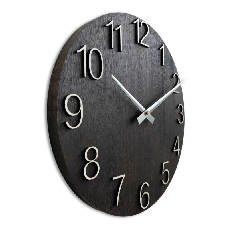 Solid wooden clock with a minimalist design and a distinctive dial.