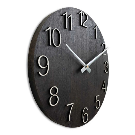 Solid wooden clock with a minimalist design and a distinctive dial.