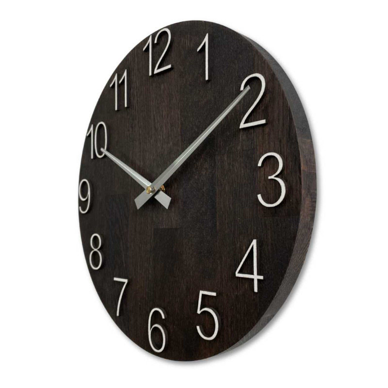 A clock made of natural wood with a light surface and a classic arrangement of numbers.