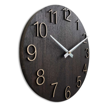 Solid wooden clock with a minimalist design and a distinctive dial.