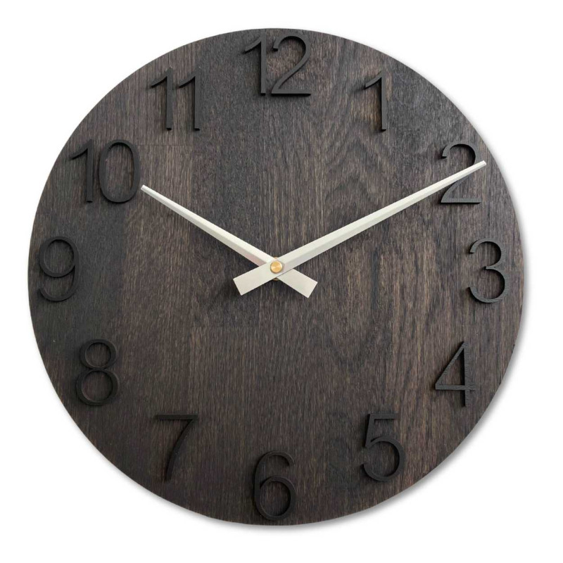 Round wooden clock with a subtle natural motif and legible numbers.