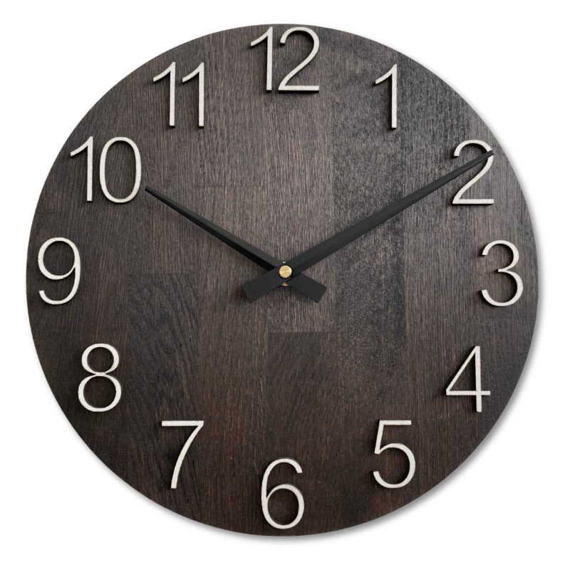 Solid wooden clock with a minimalist design and a distinctive dial.