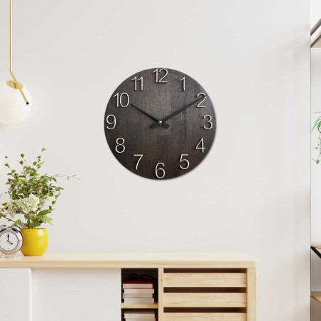 Solid wooden clock with a minimalist design and a distinctive dial.