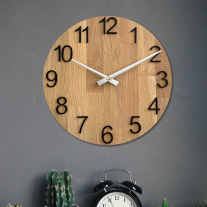 A shot of a clock face made of wood with a clean and simple look. 2