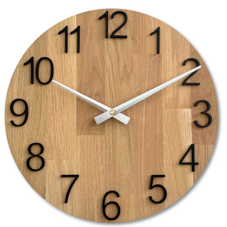 A shot of a clock face made of wood with a clean and simple look. A shot of a clock face made of wood with a clean and simple look.