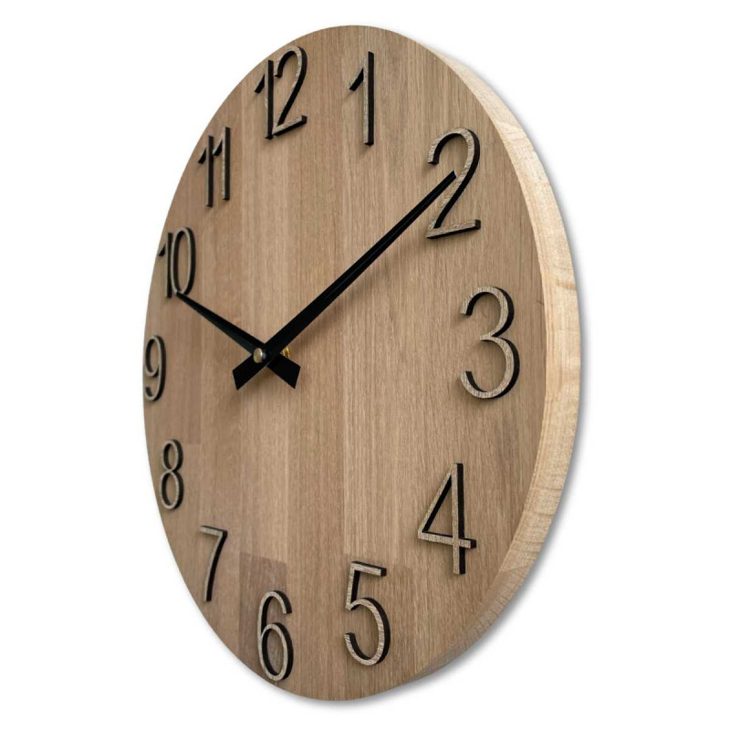 Wooden wall clock with visible material structure and smooth surface.