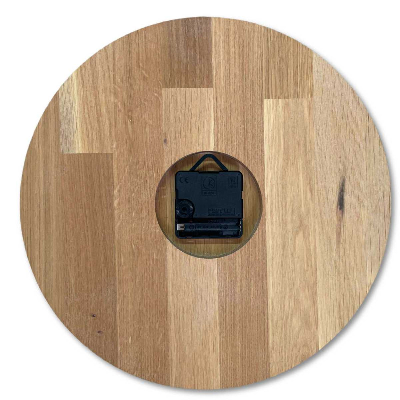 A shot of a clock face made of wood with a clean and simple look.