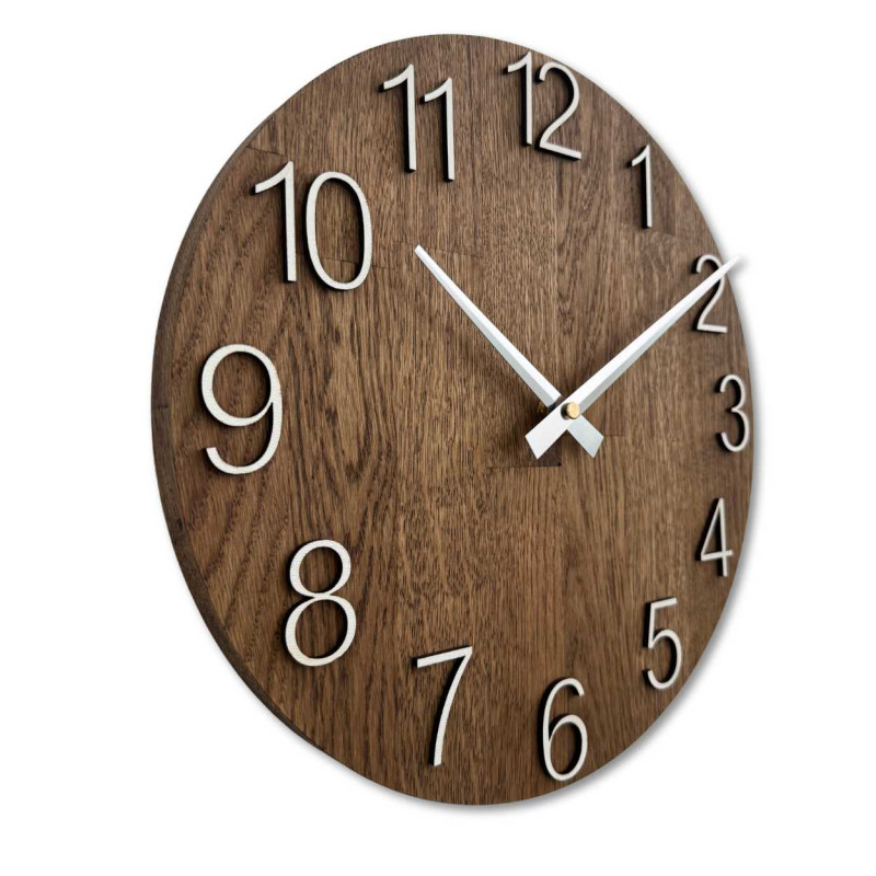 Clock made of solid wood with engraved numbers and a natural pattern.