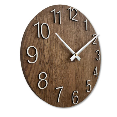Clock made of solid wood with engraved numbers and a natural pattern.